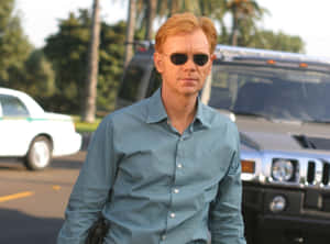 David Caruso Striking A Pose In A Black Turtleneck Sweater Wallpaper