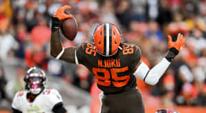 David Njoku Catching Football Action Wallpaper