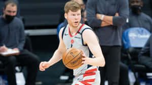 Davis Bertans In Action During A Recent Nba Game Wallpaper