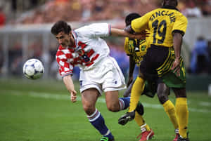 Davor Suker Intense Football Game Wallpaper