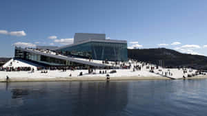 Dazzling Night View Of Oslo Opera House Wallpaper