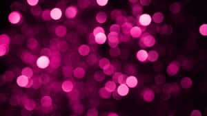 Dazzling Pink Sparkles Background Wallpaper