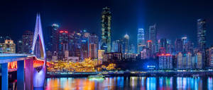 Dazzling Skyline Of Chongqing By Night Wallpaper