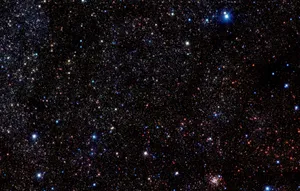 Dazzling Star Cluster Shining Brightly In The Night Sky Wallpaper