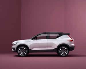 Dazzling View Of Volvo Xc40 In Rugged Terrain Wallpaper