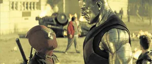 Deadpool And Colossus Team Up In Action Wallpaper