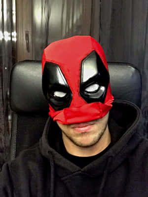 Deadpool Mask Close-up On A Black Background Wallpaper