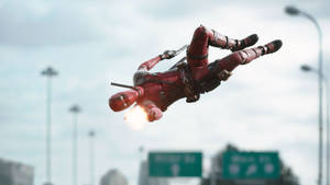 Deadpool Movie Air Flip Shooting Wallpaper