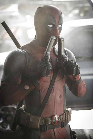 Deadpool Movie Sniffing Guns Poster Wallpaper