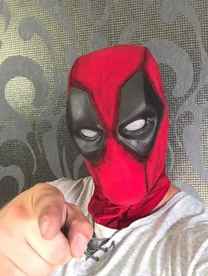 Deadpool's Iconic Red And Black Mask Wallpaper