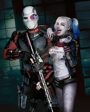 Deadshot And Harley Quinn In Action Wallpaper