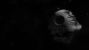 Death Star Silhouettein Space Wallpaper