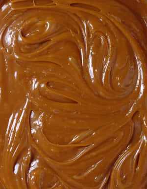 Decadent Brown Caramel Swirls Wallpaper