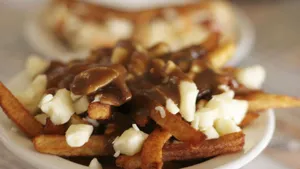 Decadent Poutine With Rich Gravy Wallpaper