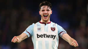 Declan Rice Celebrating Victory West Ham Uniform Wallpaper