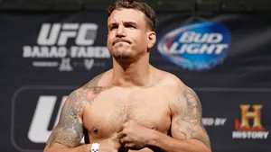 Dedicated Fighter - Frank Mir With His Iconic Tattoos Wallpaper