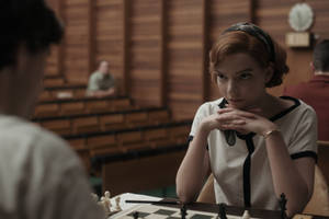 Deep In Thought While Playing Chess - Beth Harmon In The Queen's Gambit Wallpaper