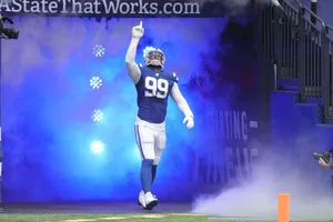 Deforest Buckner Blue Smoke On Field Entrance Wallpaper