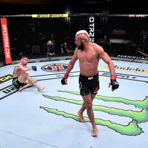 Deiveson Figueiredo Walking Away From Opponent Wallpaper