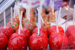 Delectable Candy Apples On Display Wallpaper