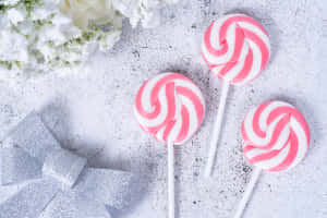 Delectable Pink Candy Delight Wallpaper