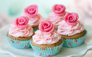 Delectable Pink Cupcakes On Display Wallpaper