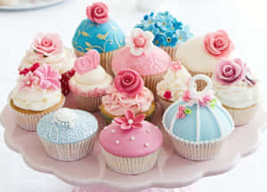 Delectable Pink Cupcakes On Display Wallpaper