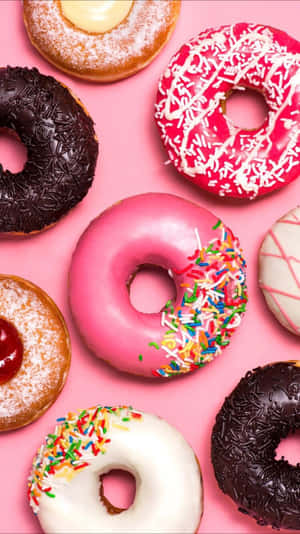 Delectable Pink Doughnuts Wallpaper