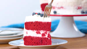 Delectable Slice Of Red Velvet Cake Wallpaper