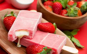 Delectable Spring Desserts On A Sunny Outdoor Table Wallpaper