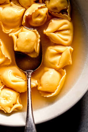 Delicate, Authentic Italian Tortellini In Brodo Soup Wallpaper