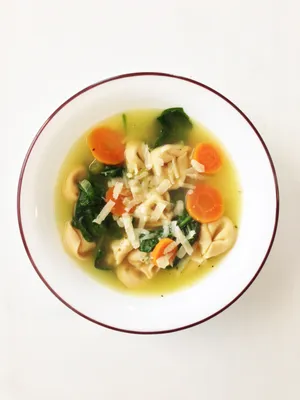 Delicate Tortellini In Brodo With Carrots And Spinach Wallpaper