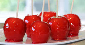 Delicious And Colorful Candy Apples Wallpaper