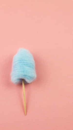 Delicious And Fluffy Cotton Candy On A Stick Wallpaper