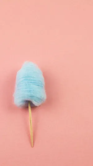 Delicious And Fluffy Cotton Candy On A Stick Wallpaper