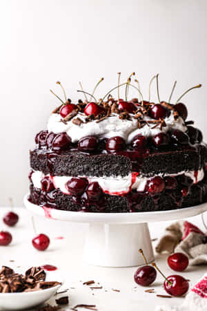 Delicious Black Forest Cake With Cherries Wallpaper