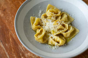 Delicious Cheesy Tortellini In Brodo Wallpaper