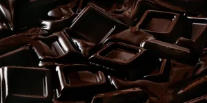 Delicious Dark Chocolate Pieces Wallpaper