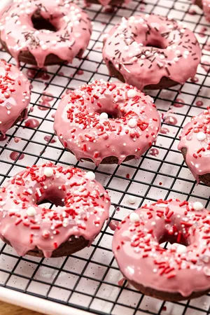 Delicious Glazed Donut Perfectly Coated In Sweet Icing Wallpaper