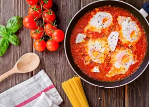 Delicious Homemade Red Sauce In A Ceramic Bowl Wallpaper