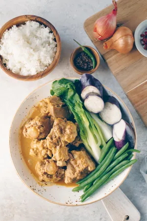 Delicious Kare-kare With Rice - A Filipino Cuisine Delight Wallpaper