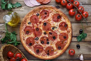 Delicious Large Pepperoni Pizza Wallpaper