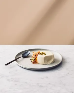 Delicious Minimalist Food Spread On A Wooden Surface Wallpaper