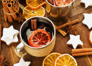 Delicious Mulled Wine Served In A Rustic Setting Wallpaper