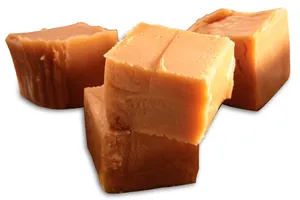 Delicious Penuche Fudge On A Rustic Wooden Table Wallpaper