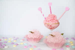 Delicious Pink Cupcakes On Display Wallpaper