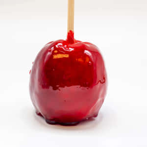 Delicious Red Candy Apples Ready For A Sweet Bite Wallpaper