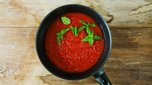 Delicious Red Sauce In A Bowl Wallpaper