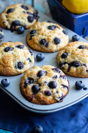 Deliciously Sweet Blueberry Muffins, Ready To Snack On Wallpaper