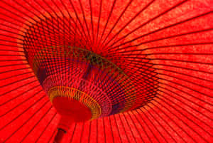 Delightful Japanese Night View With Red Lanterns Illuminating The Street Wallpaper